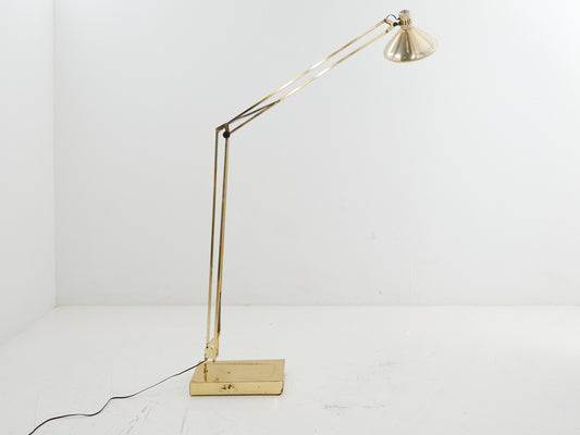 Brass adjustable floor lamp from the side