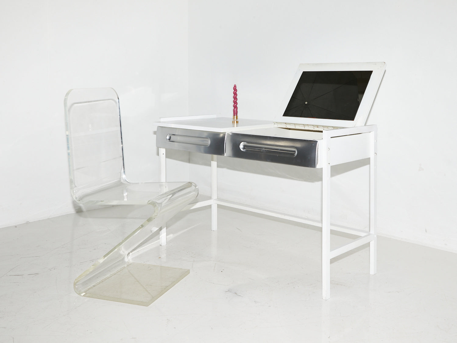 White flip-top desk in the style of Raymond Loewy with silver drawer fronts