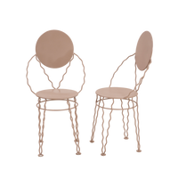 Pair of Serpantine Iron Bistro Chairs