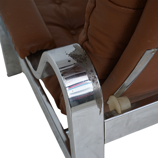 Tufted Vinyl & Chrome Recliner