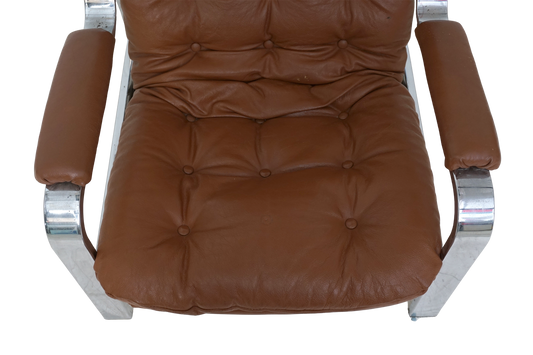 Tufted Vinyl & Chrome Recliner