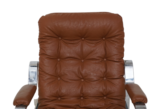 Tufted Vinyl & Chrome Recliner